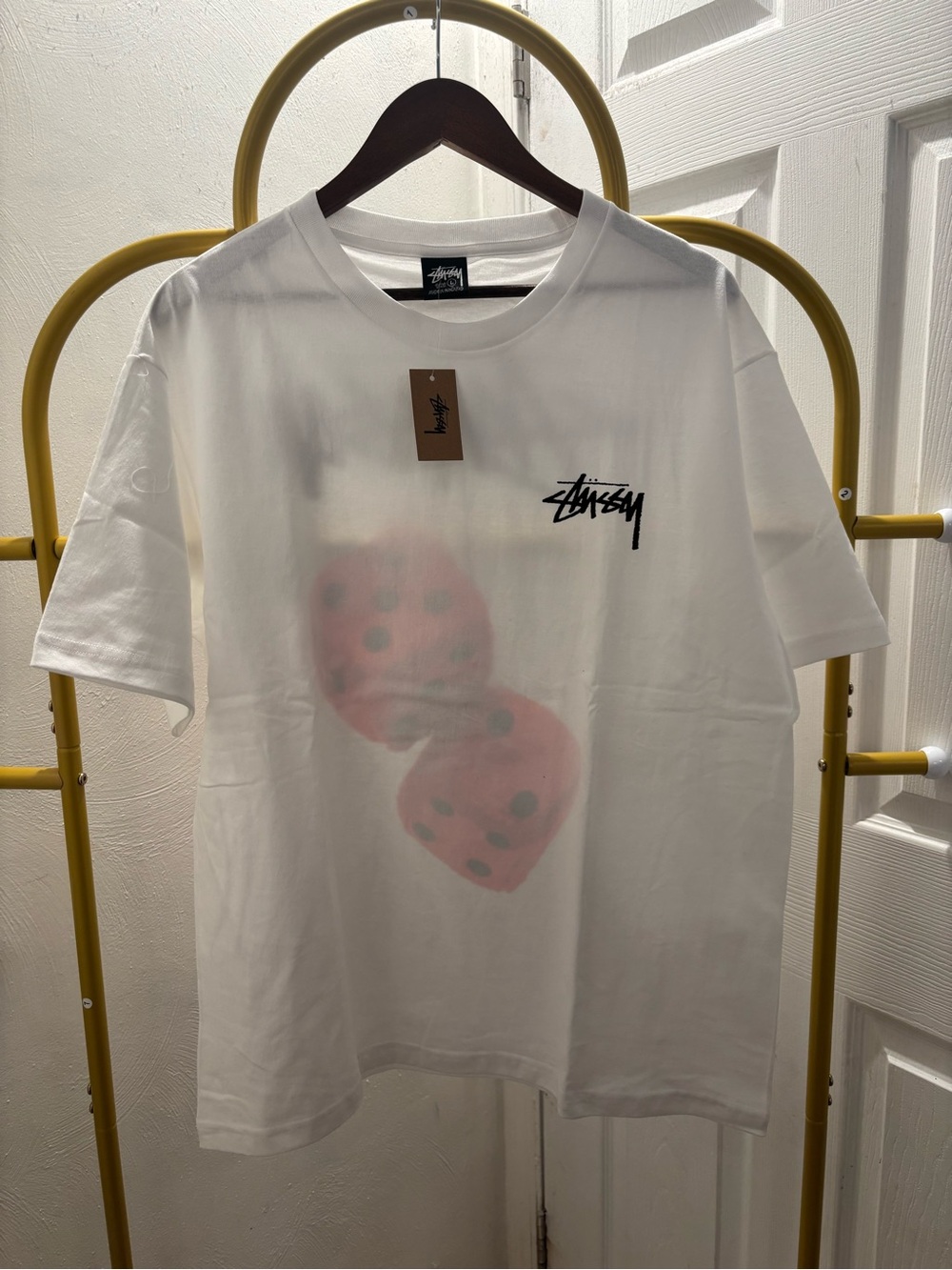 Stussy White Tee with Black Logo and Pink Dice Accent